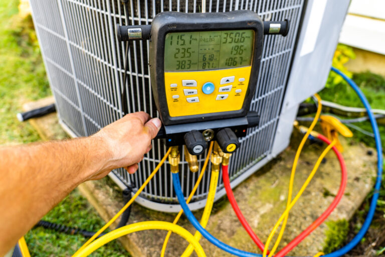 technician performing Air conditioner repair on a unit in Montgomery County, PA