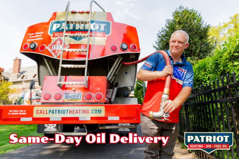a technician from Patriot Heating, Air and Fuel Oil pulls a hose from a truck to give same-day oil delivery to a home in Levittown, PA